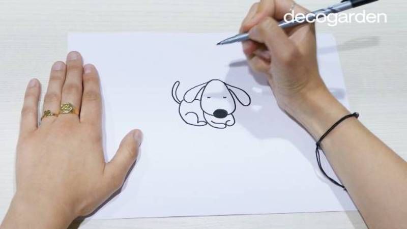 Paso 3 para dibujar un perro durmiendo.