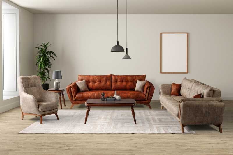 Salón de estilo mid century con sofá de cuero.