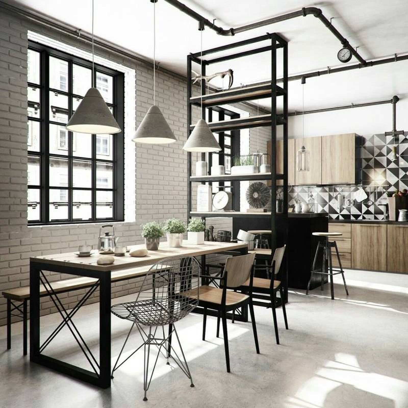Cocina abierta al comedor moderna de estilo industrial.