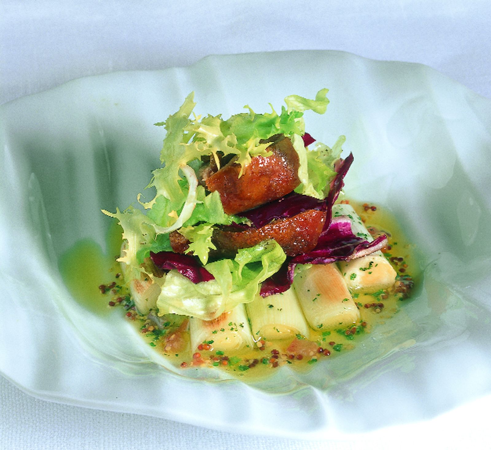 Ensalada de pato confitado con puerros y mostaza