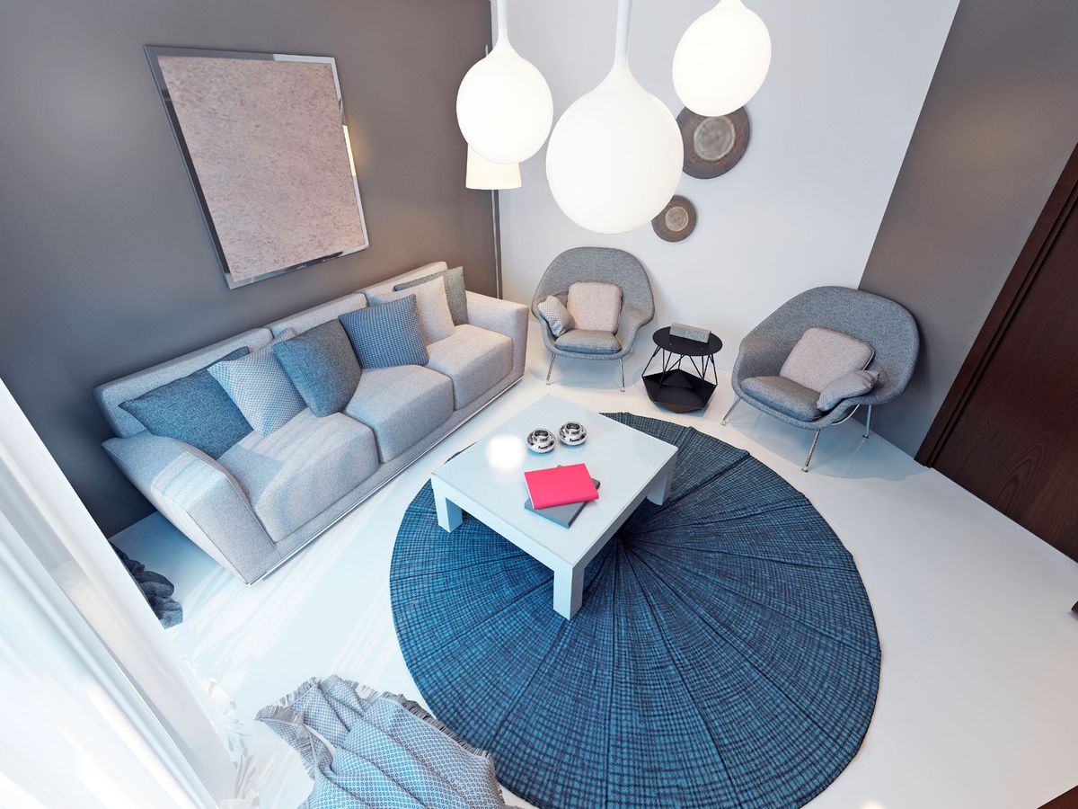 Decoración de salón en azul, gris y marrón 9