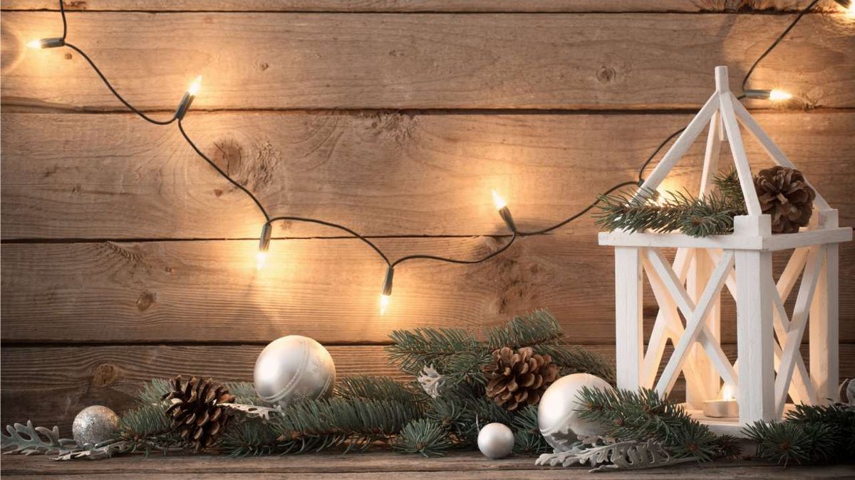 Farolillo navideño con vela.