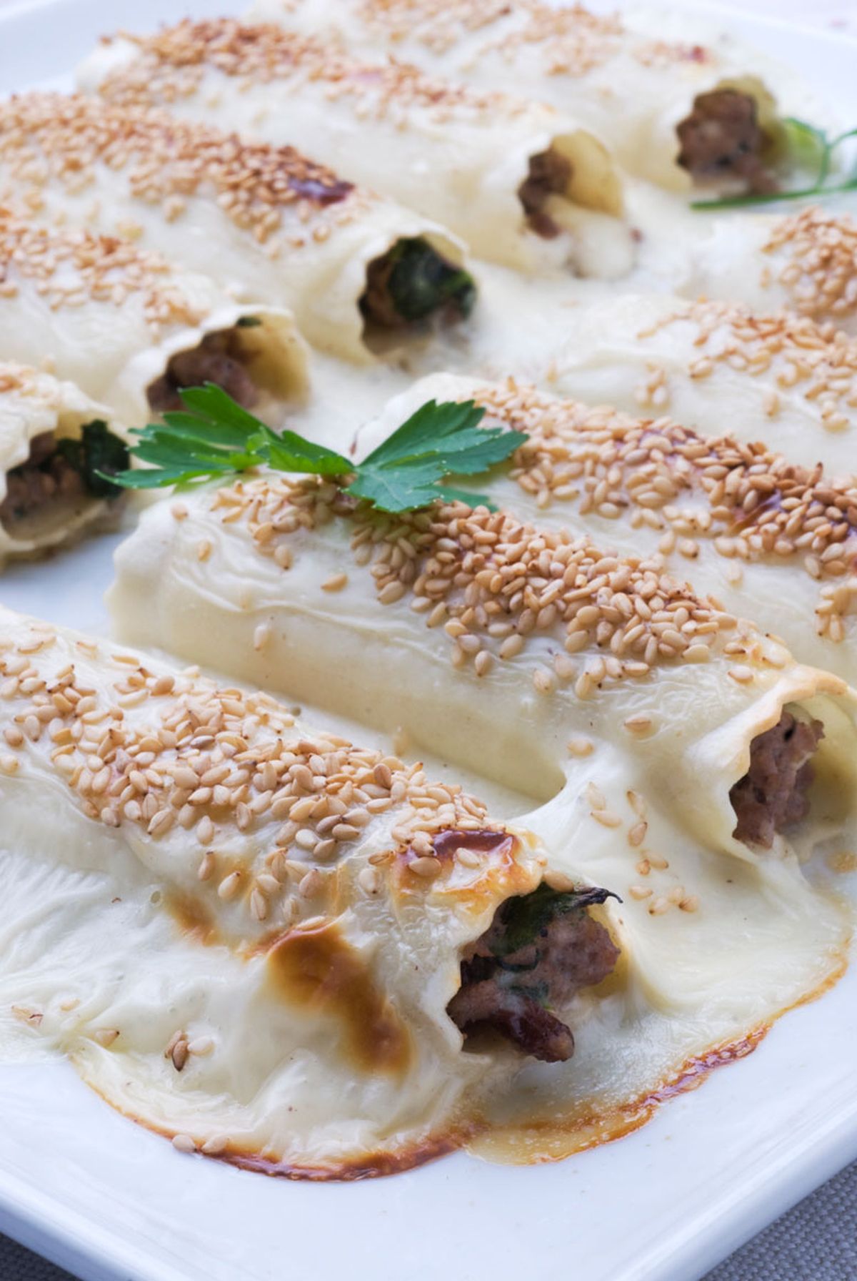 Canelones de carne con queso fresco y espinacas