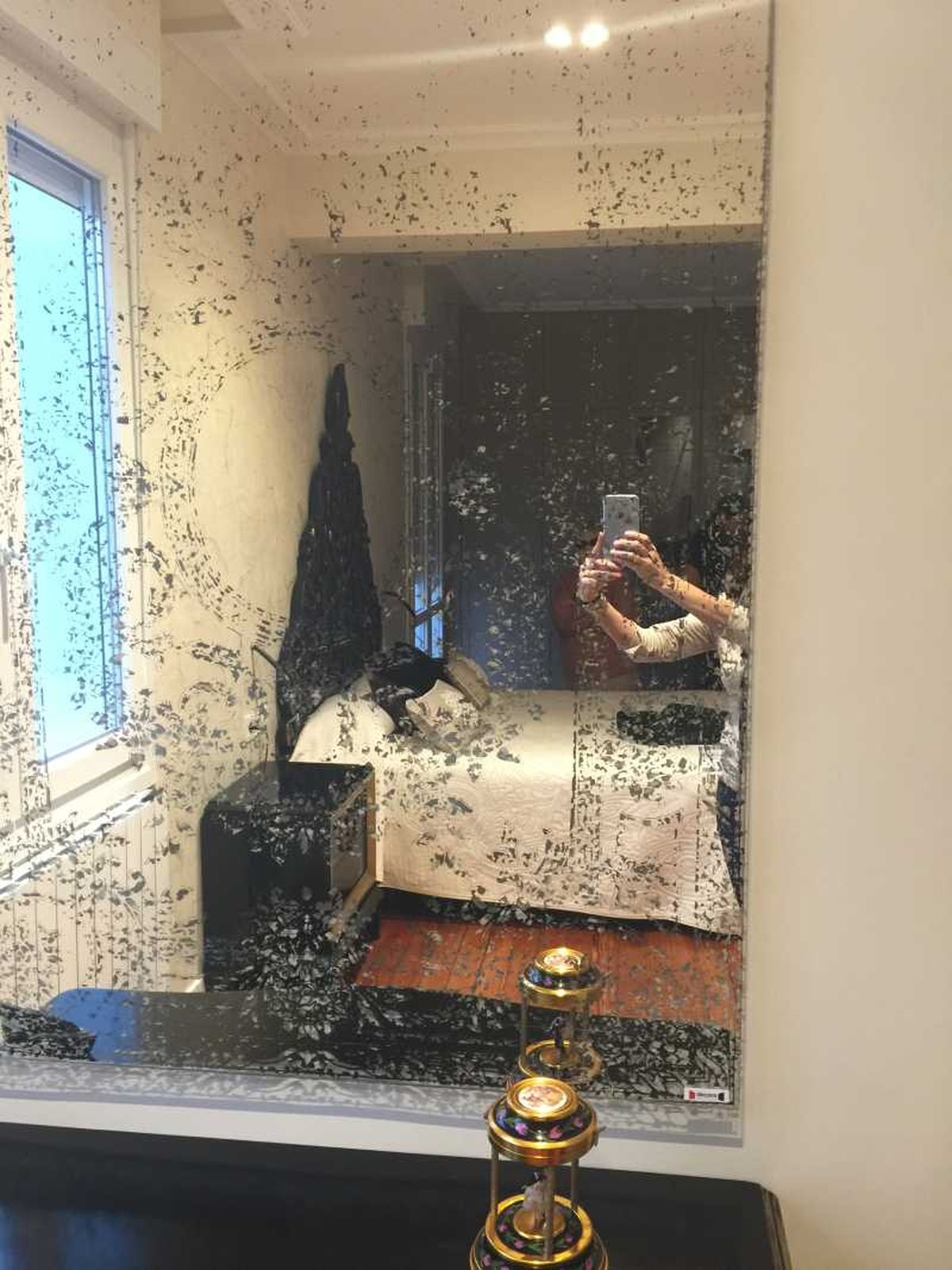 Espejo de efecto desgastado.