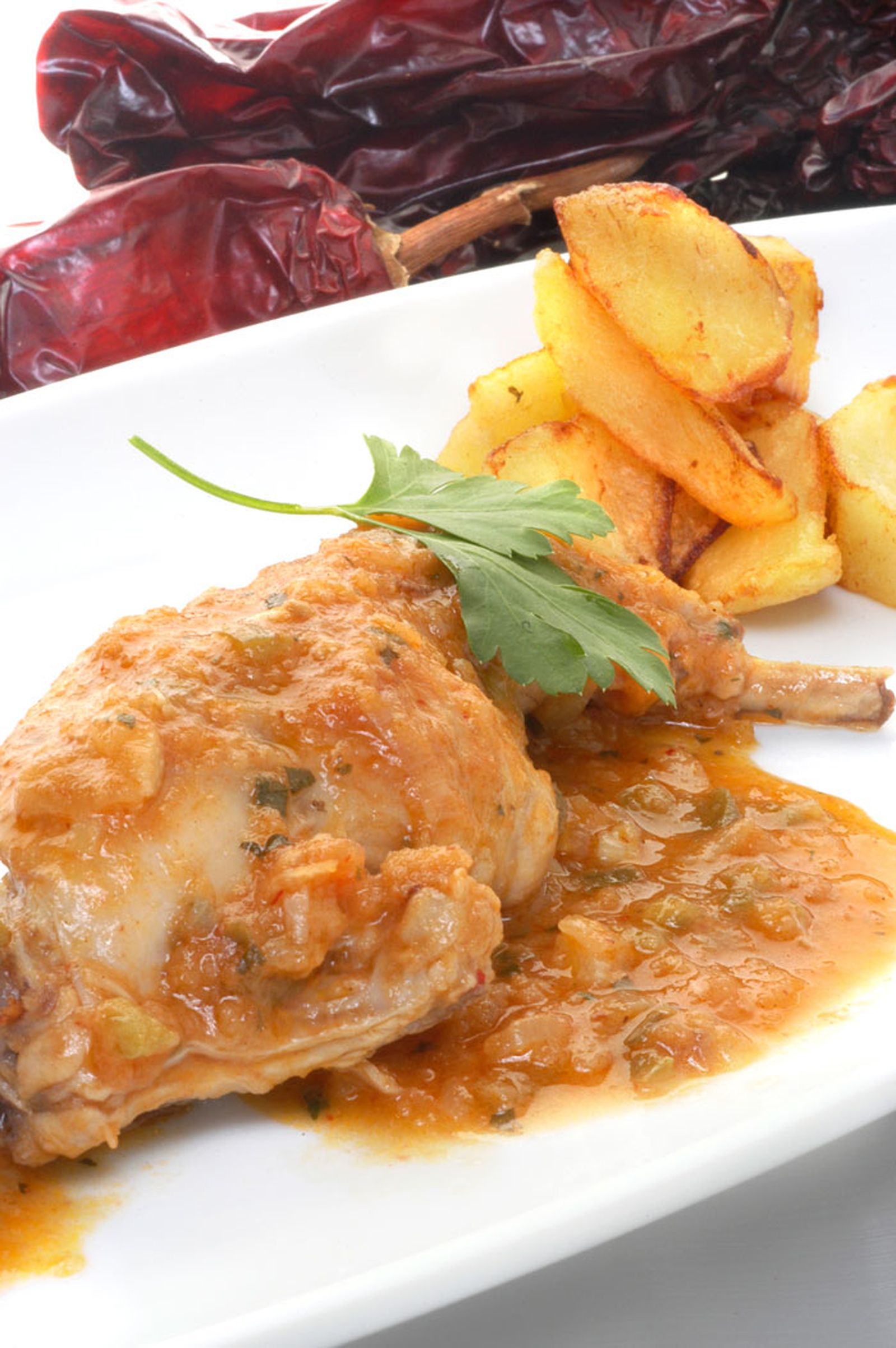 Conejo al chilindrón con patatas