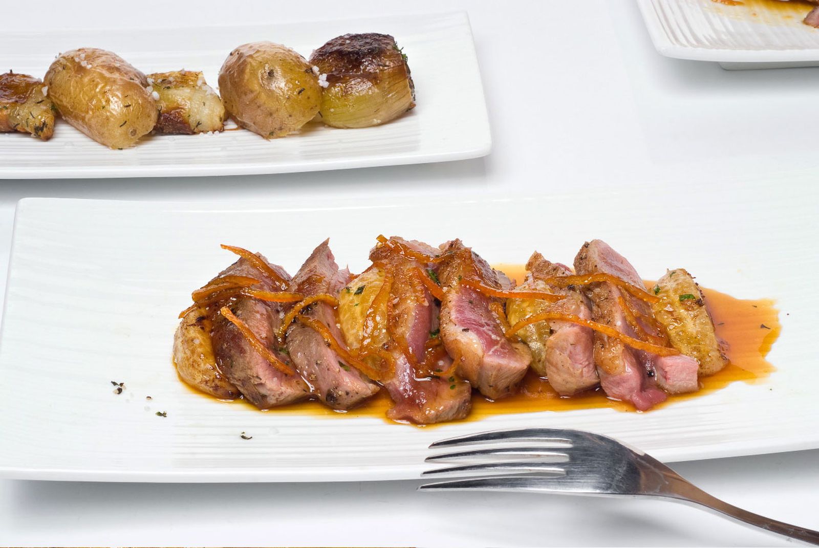 Magret de pato a la mandarina