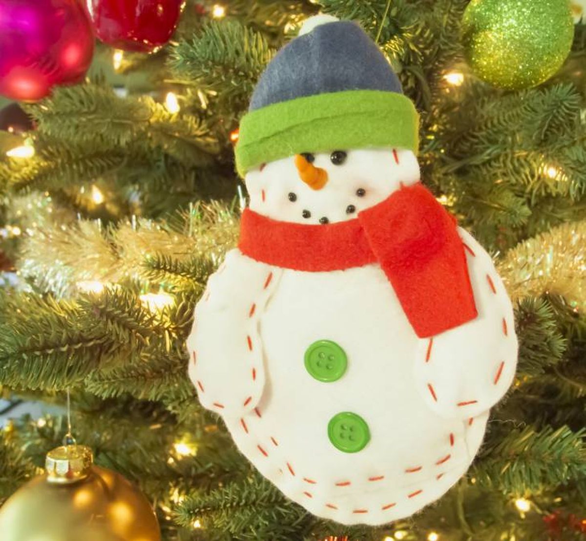 Muñeco de nieve de fieltro infantil