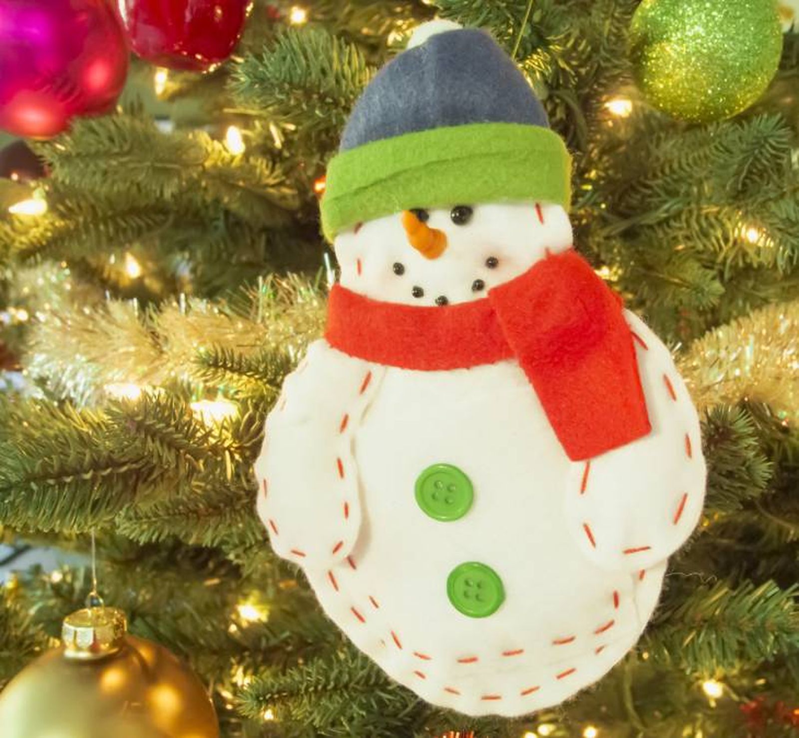 Muñeco de nieve de fieltro infantil