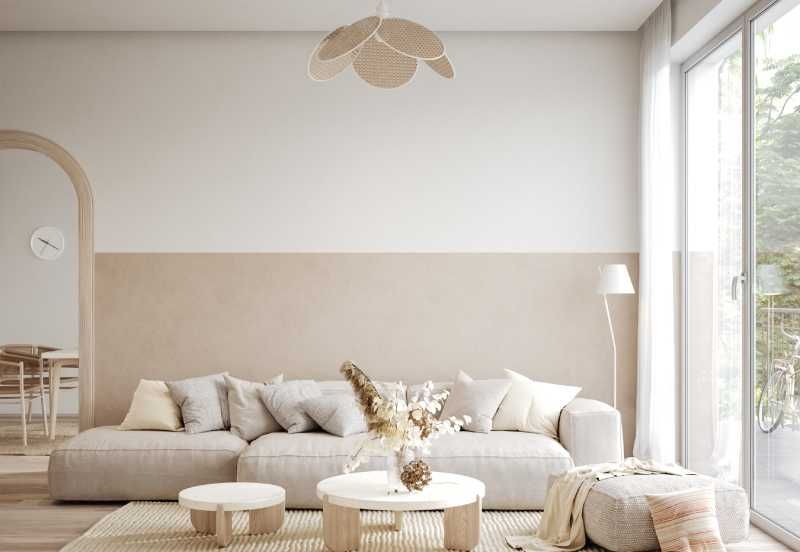 Salón sencillo y moderno con decoración en tonos claros y madera.