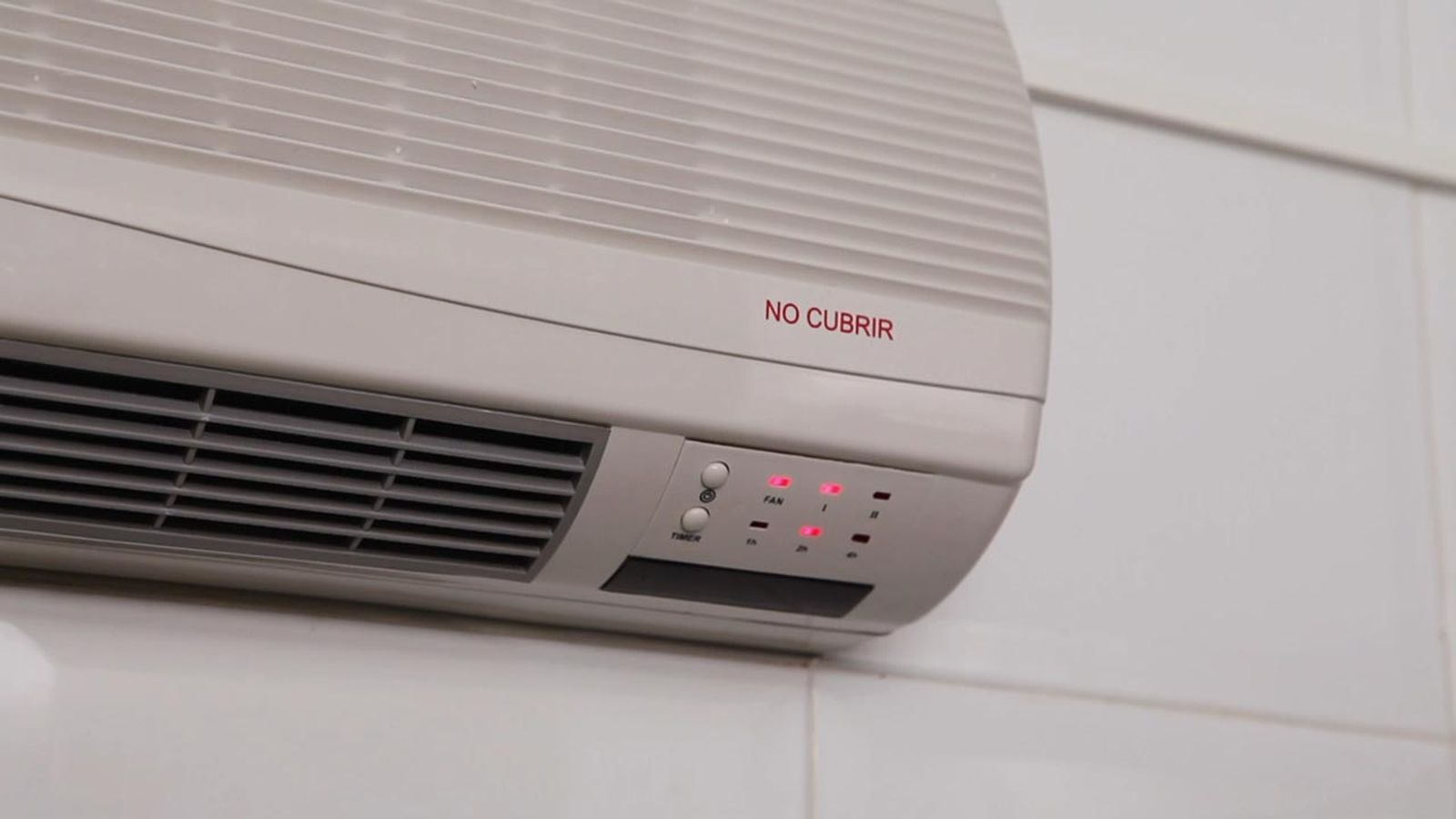 Cómo instalar un calefactor eléctrico de pared paso 14