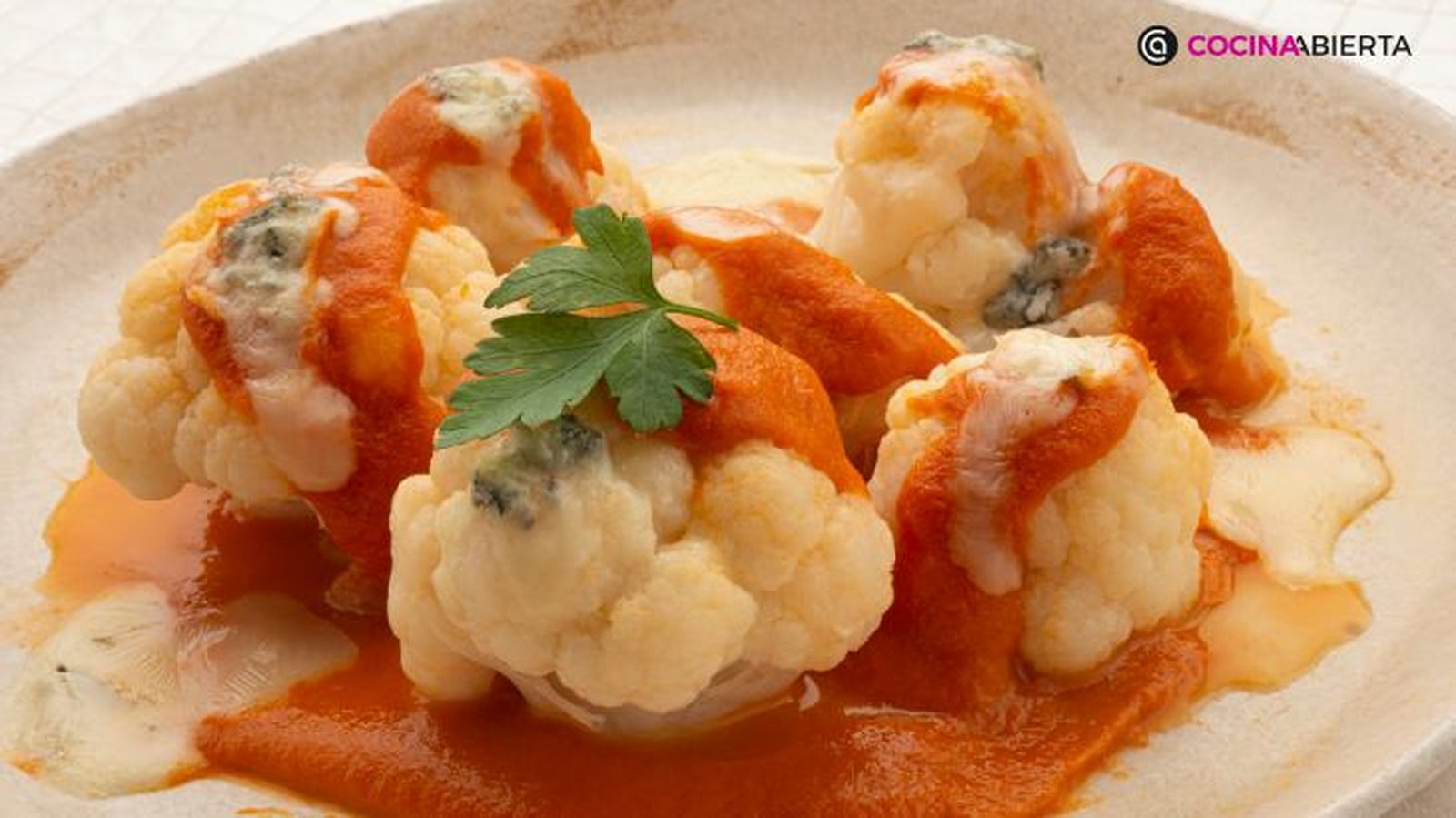 Coliflor con tomate y queso