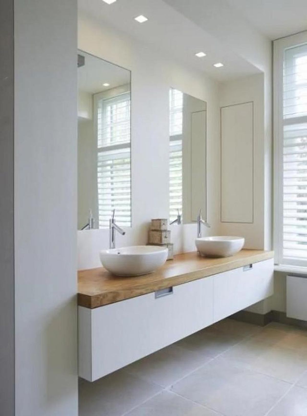 Razones para decorar el baño en color blanco 10