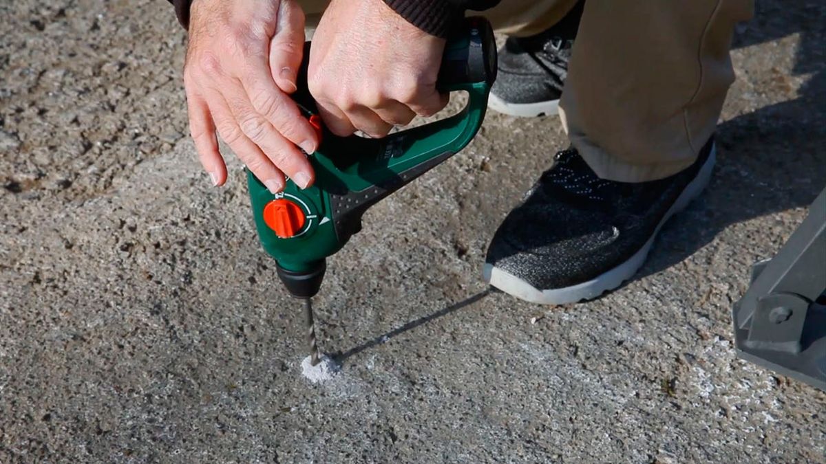 Colocar barrera de aparcamiento abatible paso 2