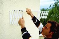 Colocar un tendedero de ropa extensible paso 4