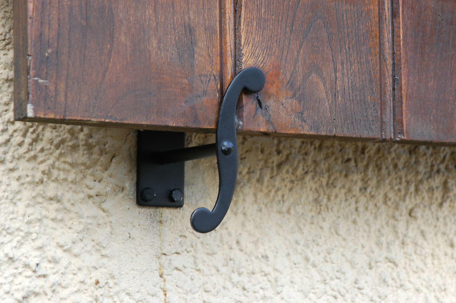 Cambio de sujeción de contraventana