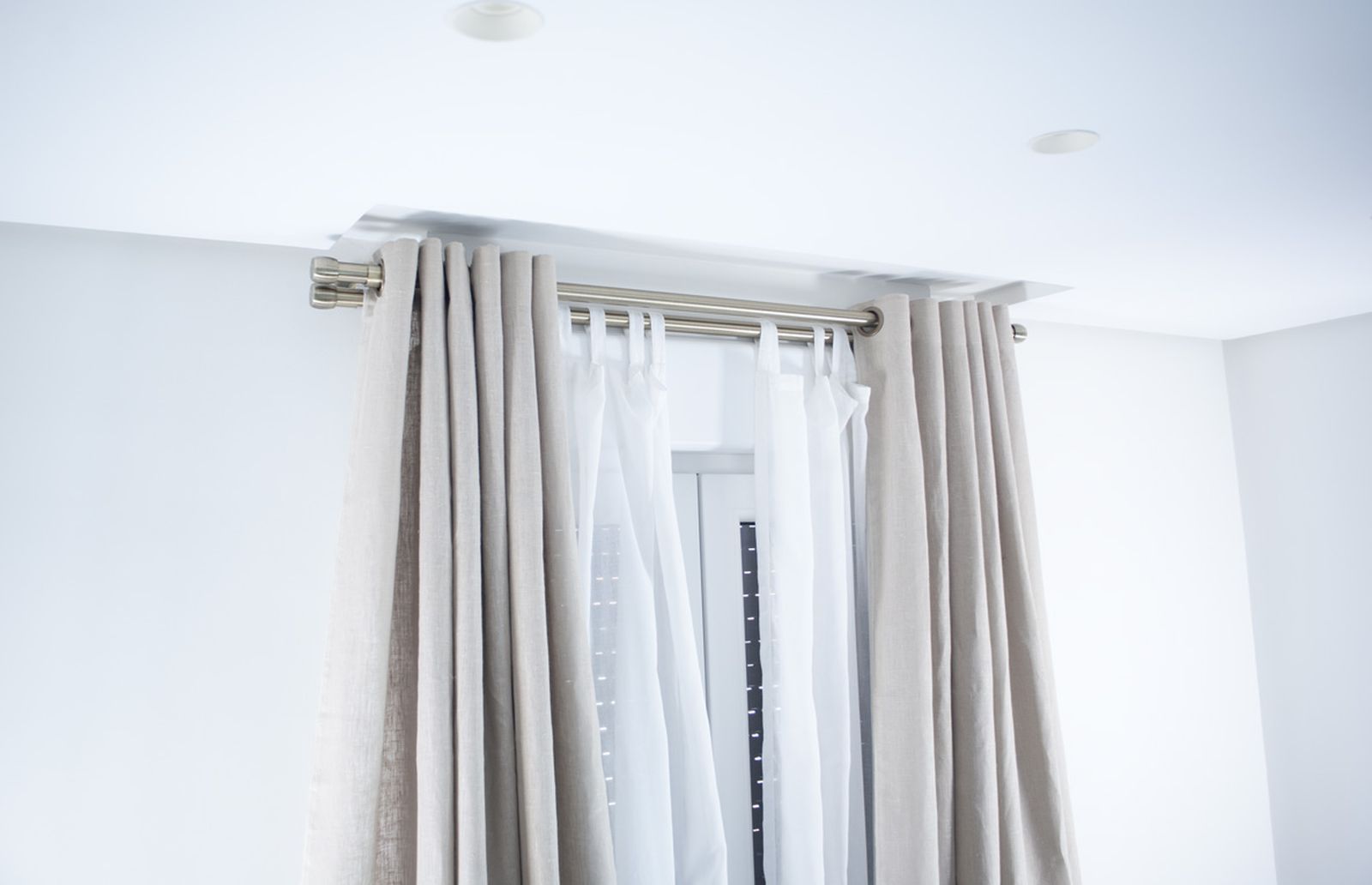 Colocar barra de cortina doble