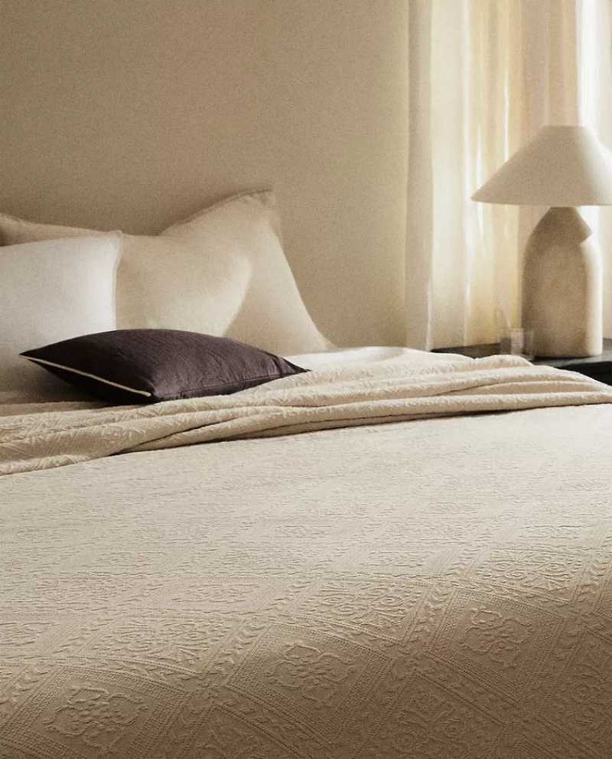 Colcha de algodón con dibujo geométrico.