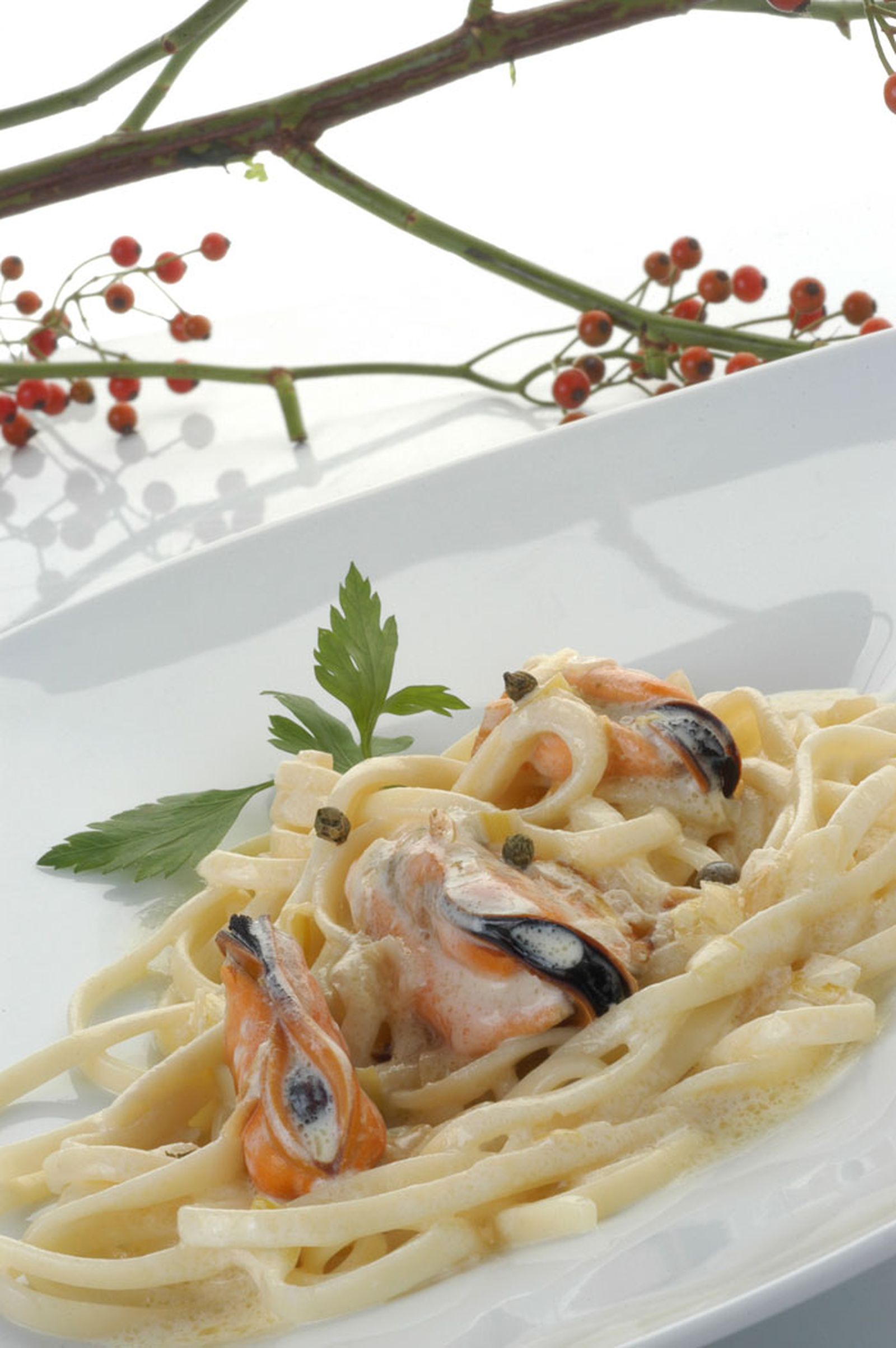 Pasta con mejillones a la pimienta verde