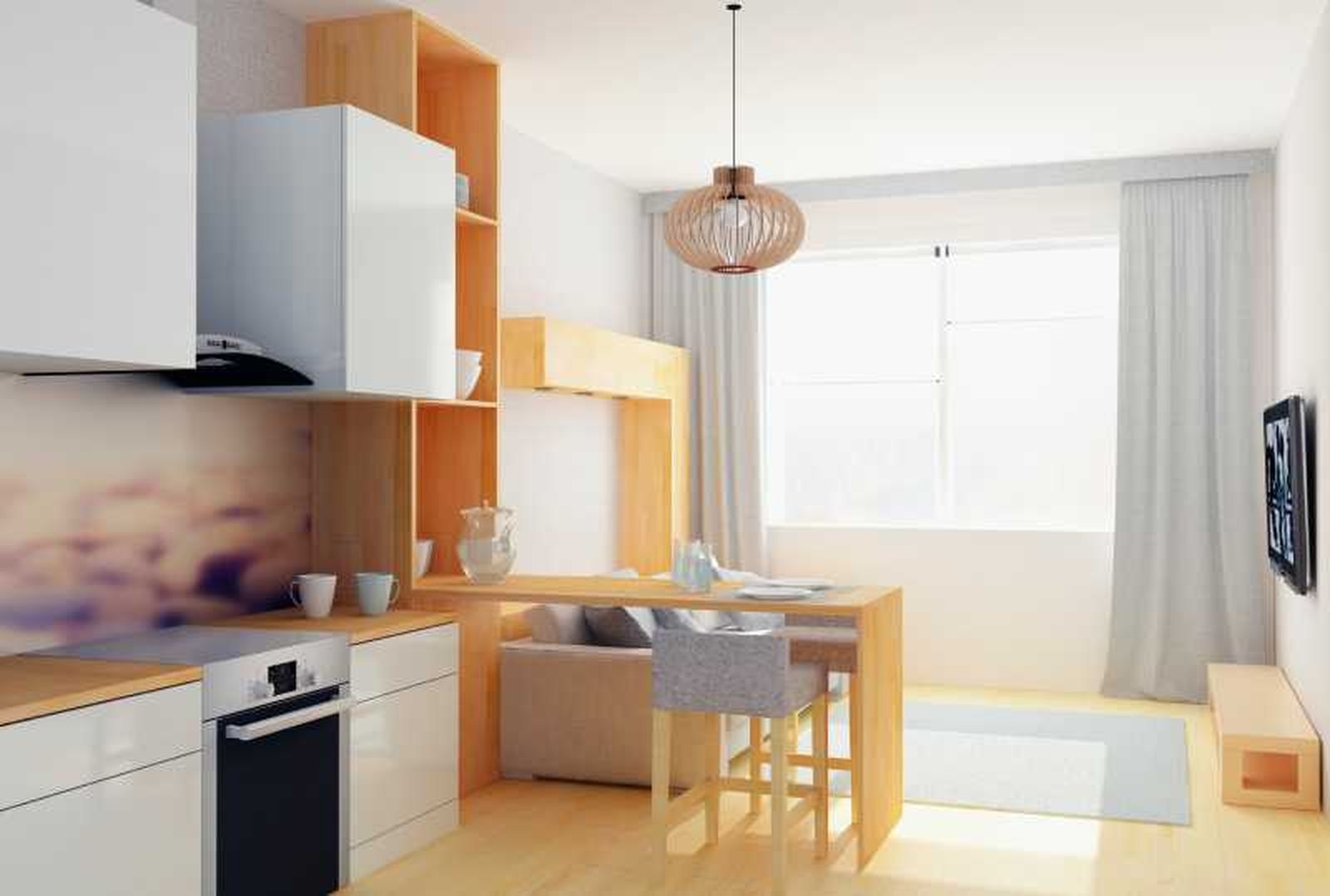 Estudio pequeño con muebles prácticos.