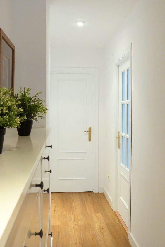 puerta blanca francesa manilla dorada