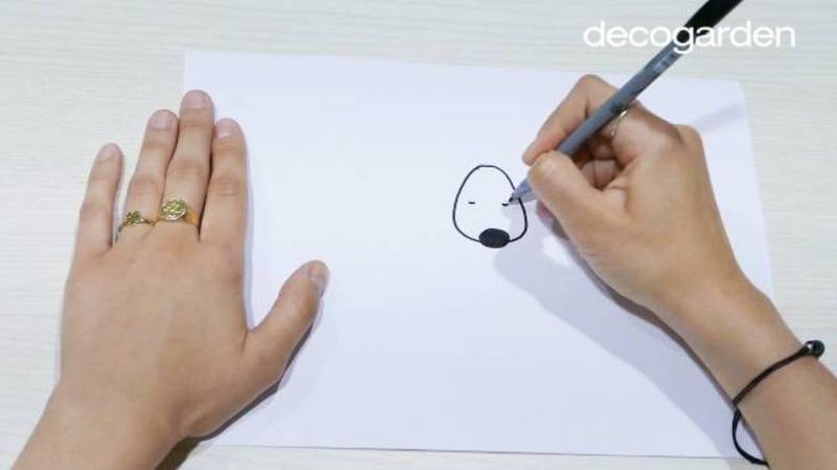 Paso 1 para dibujar un perro durmiendo.