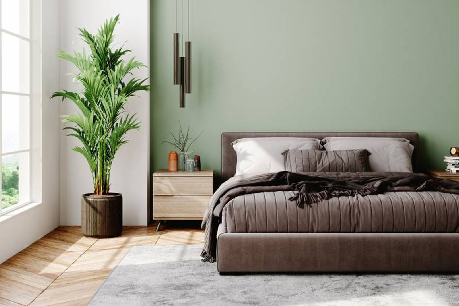Dormitorio decorado en verde hoja y tonos terrosos.