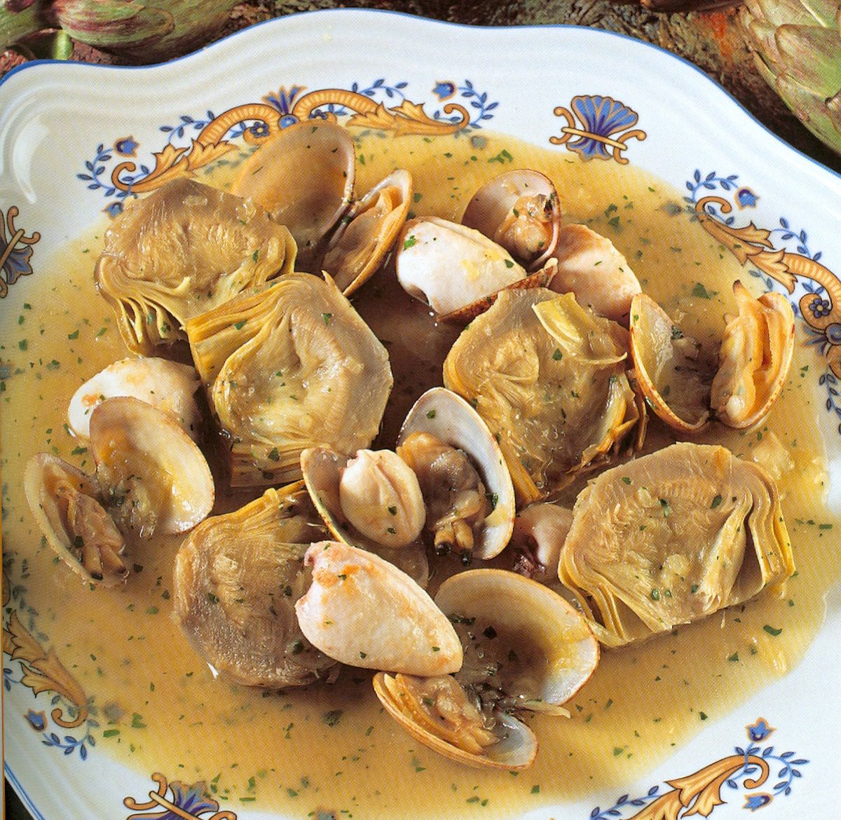 Receta de alcachofas con almejas y calamares