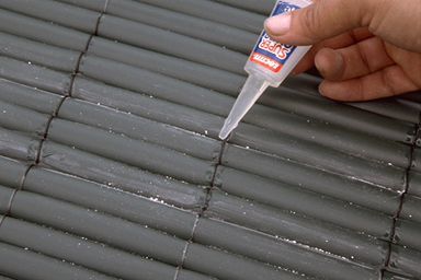 Forrar puerta metálica exterior con cañizo de plástico paso 2