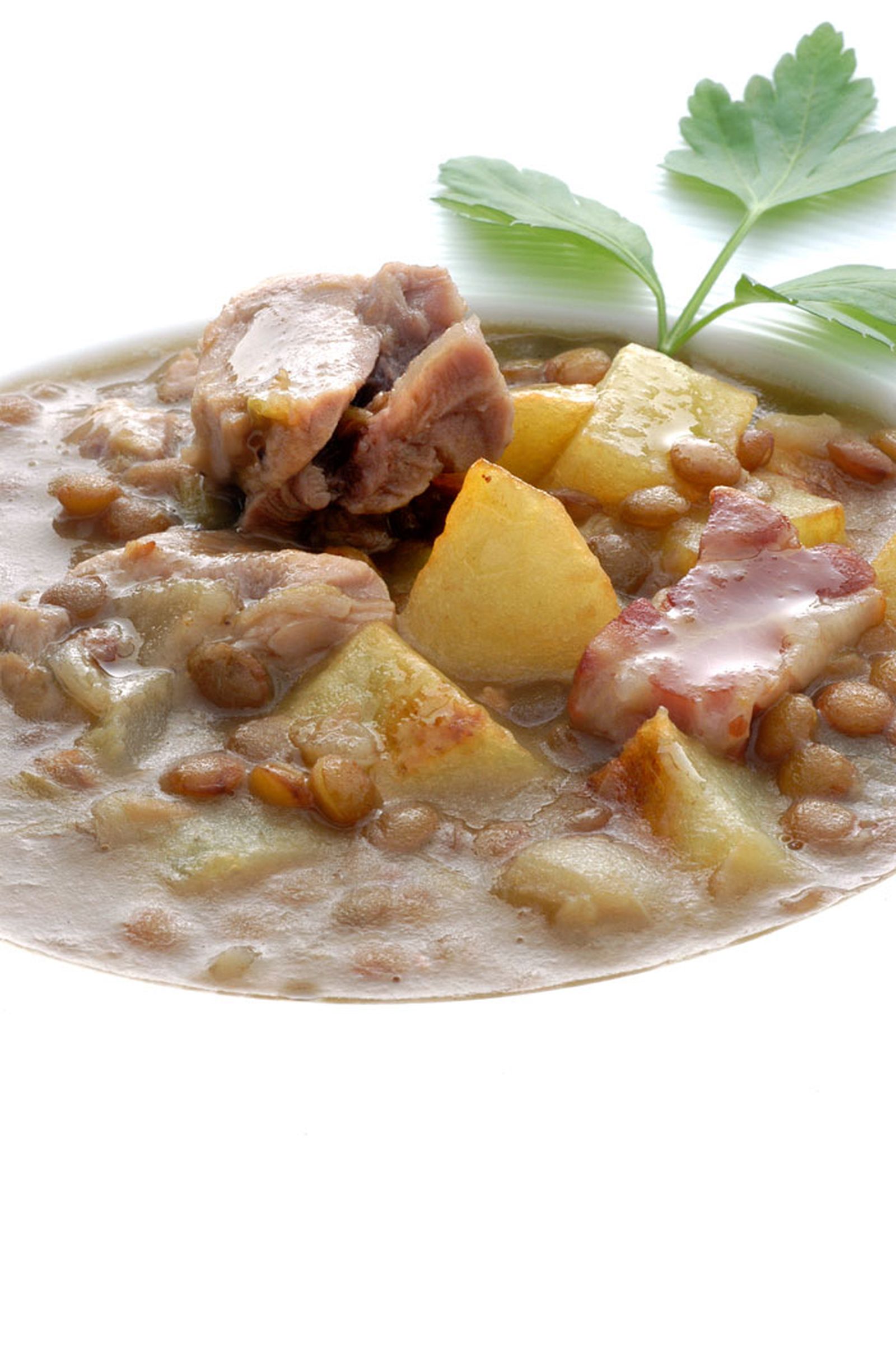 Guiso de lentejas con codillo