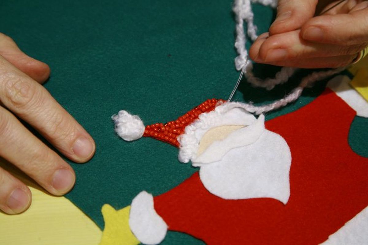 Calcetín de Navidad de fieltro paso 12