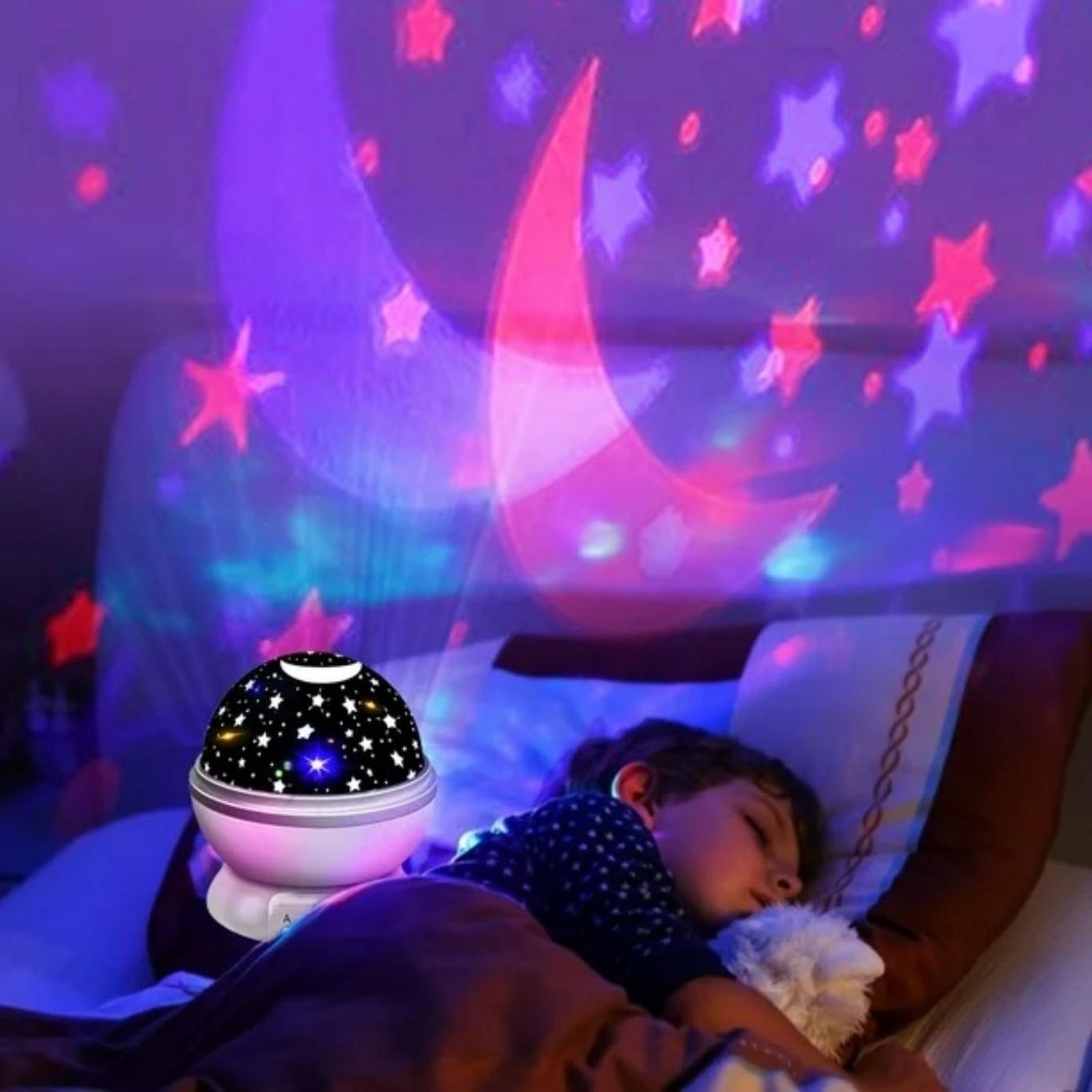 Lámpara proyector de lunas y estrellas.