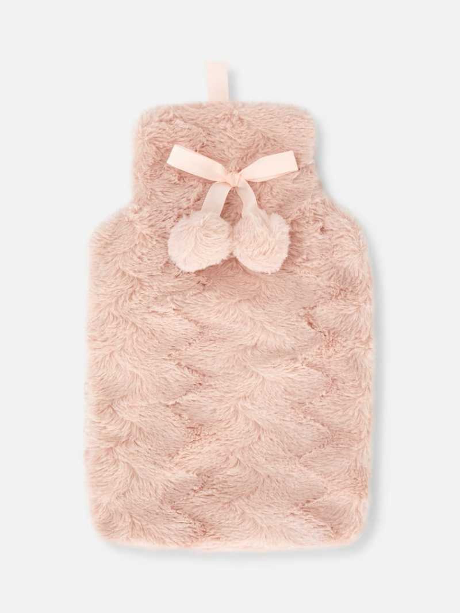Bolsa de agua caliente de pelo rosa.