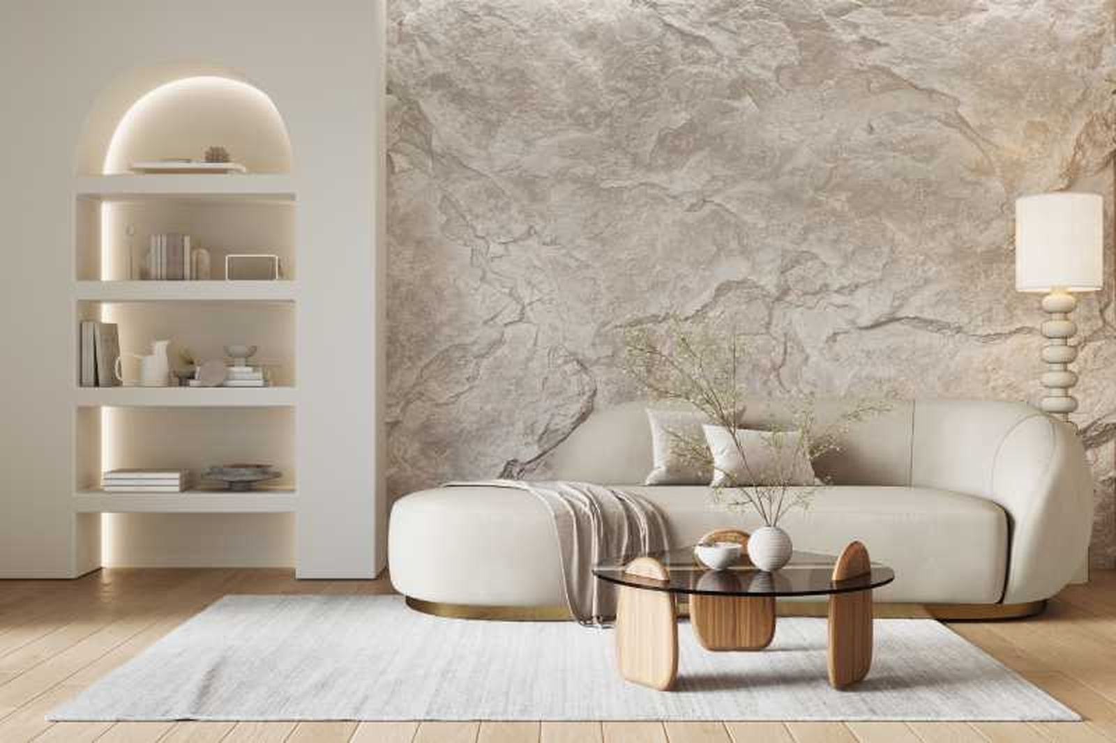 Salón acogedor con pared de piedra.
