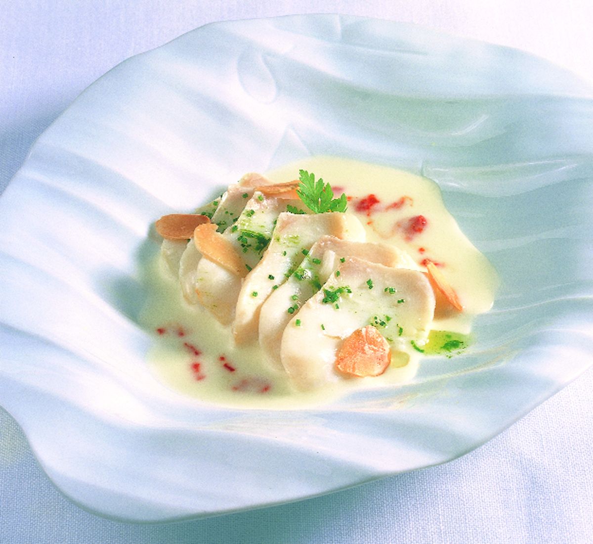 Vichyssoise con bacalao en láminas y picadillo de pimientos rojos