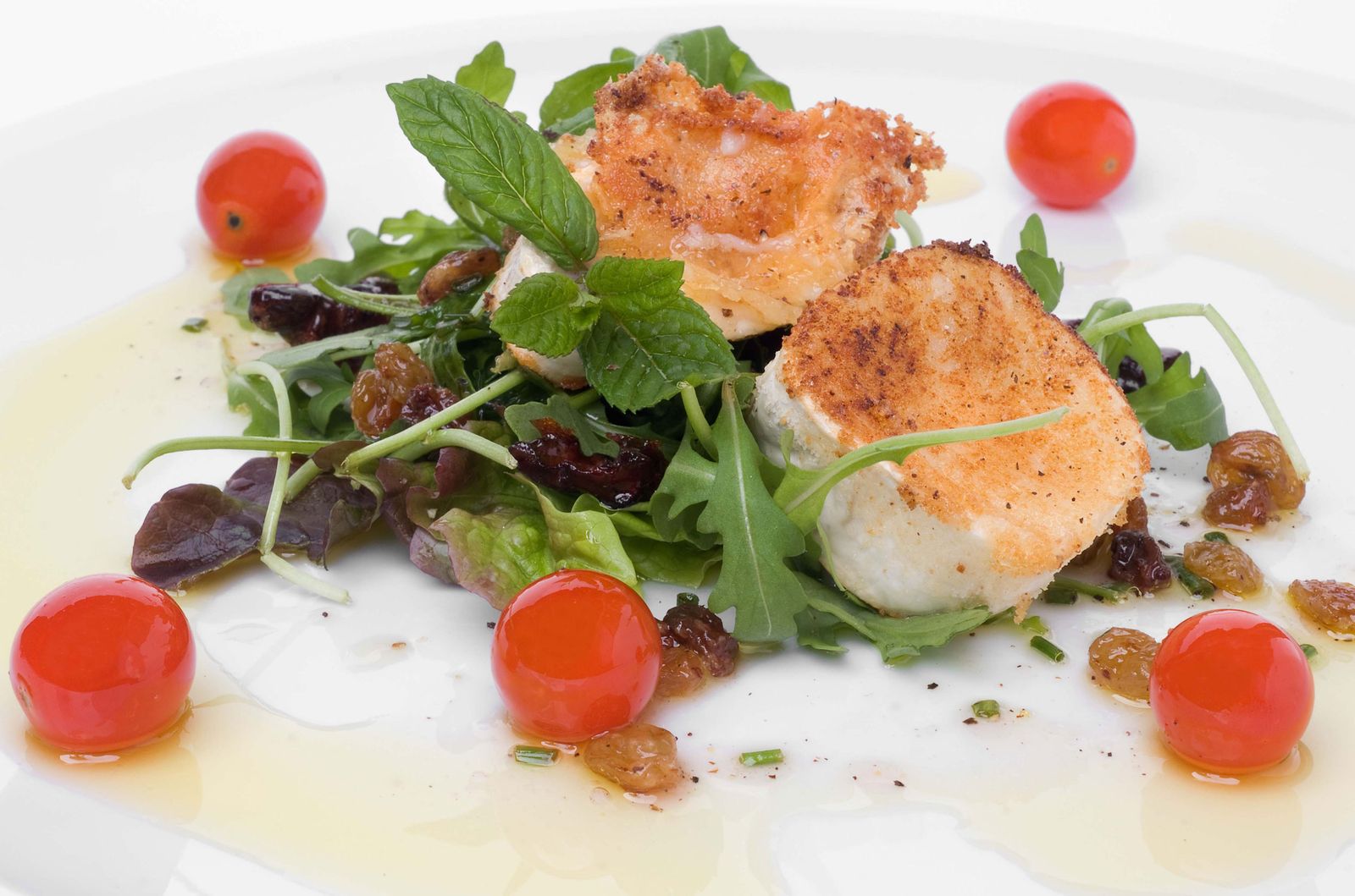 Ensalada de rúcula, queso de cabra y nueces