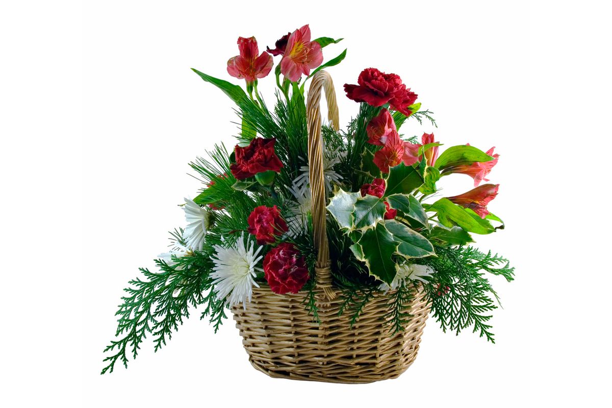 Composición floral navideña en cestos de mimbre de jardineria