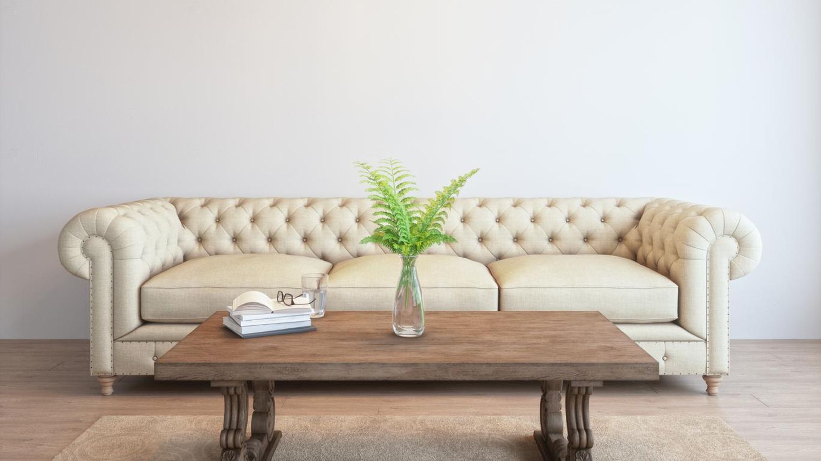 Salón con sofá Chester beige.