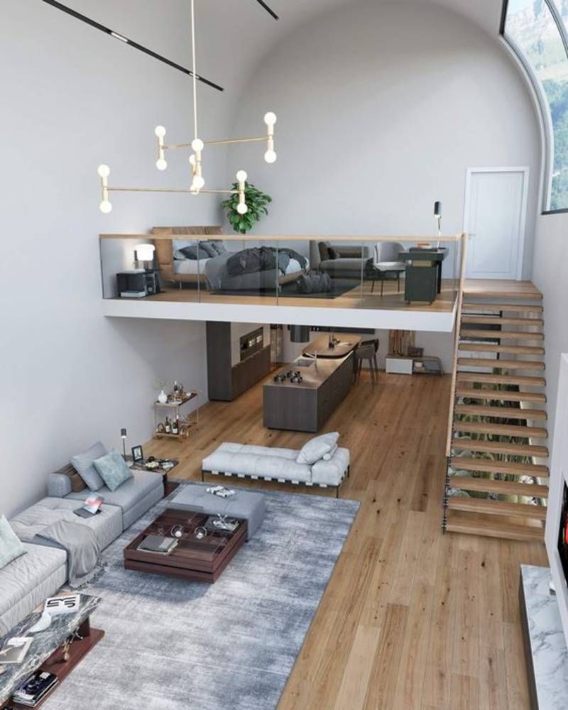 Loft amplio con complementos en gris.
