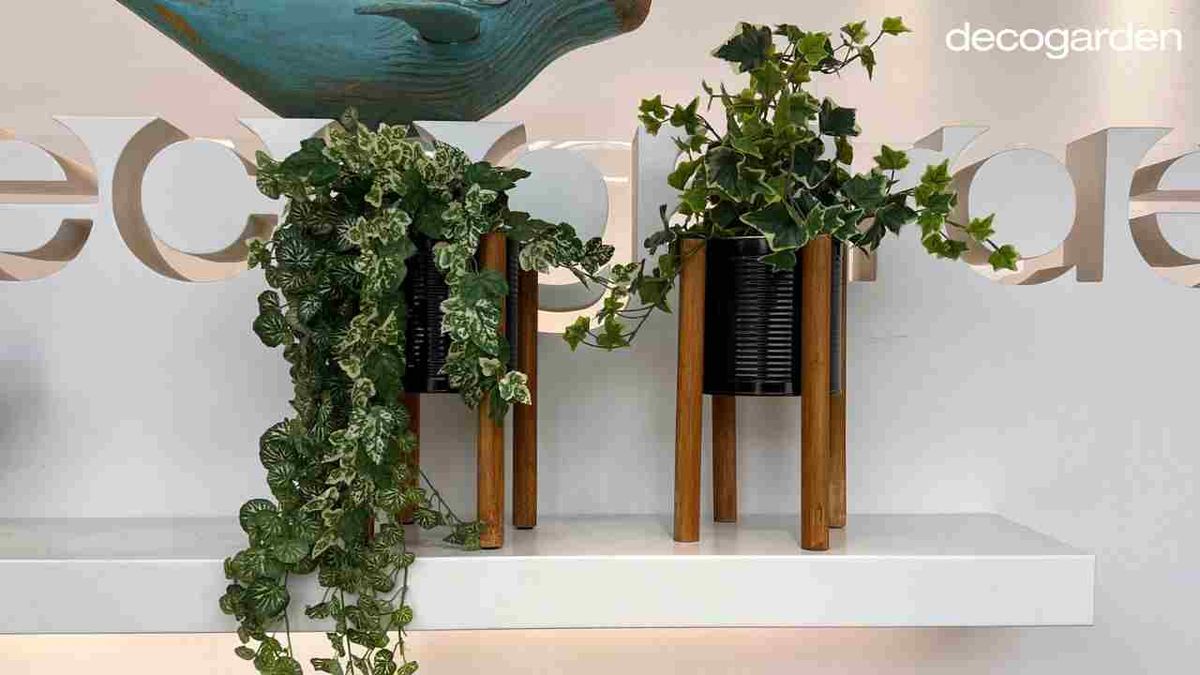 Maceteros hechos con latas reutilizadas