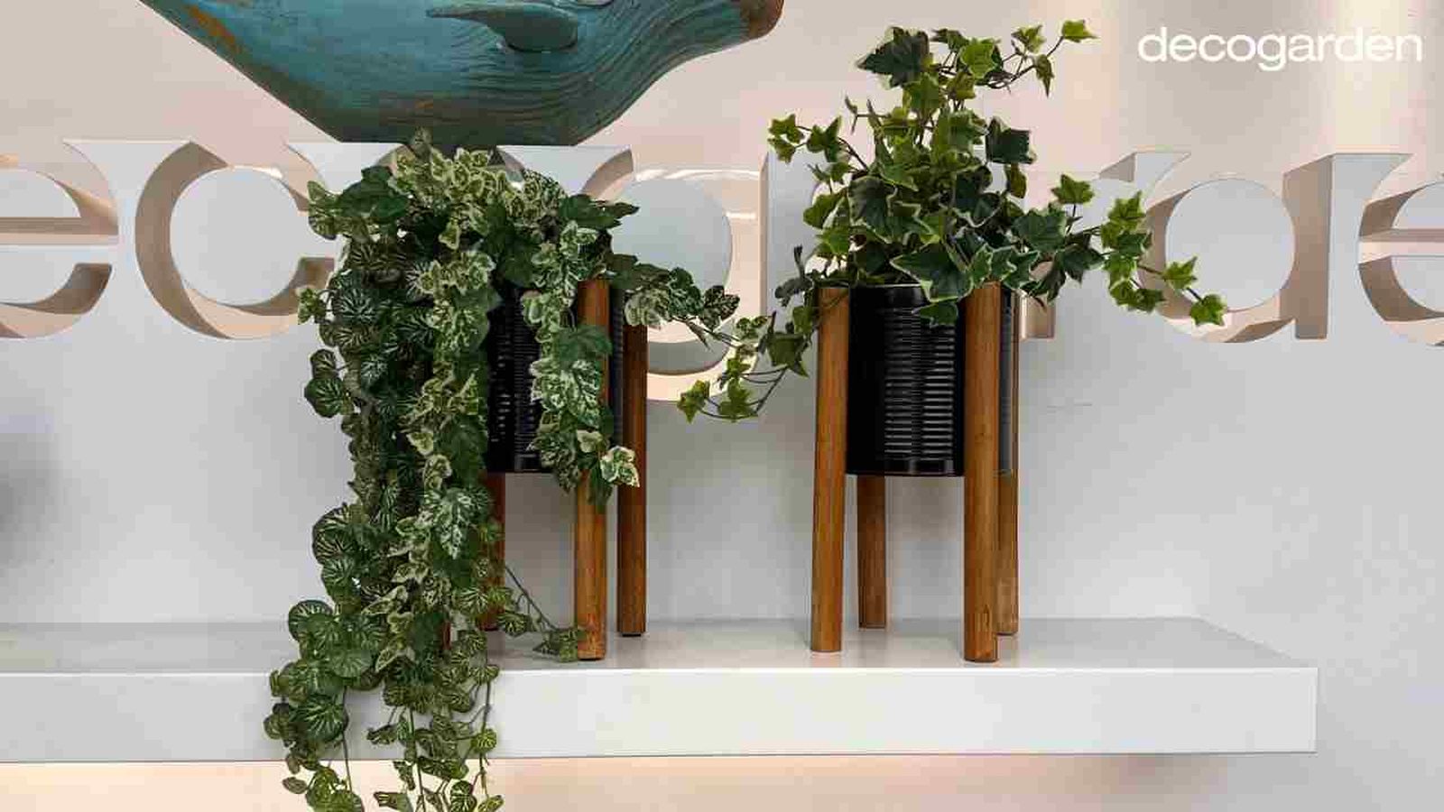 Maceteros hechos con latas reutilizadas