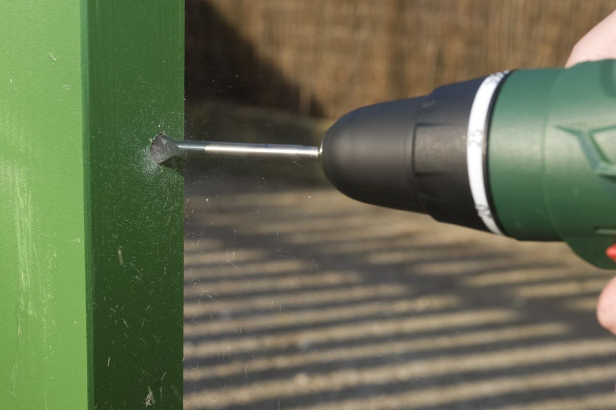 Cercado de madera para el jardín paso 27