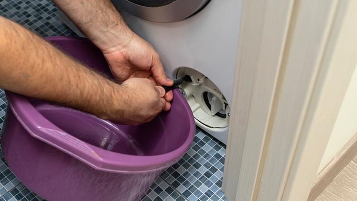 como limpiar filtro lavadora carga frontal paso 2