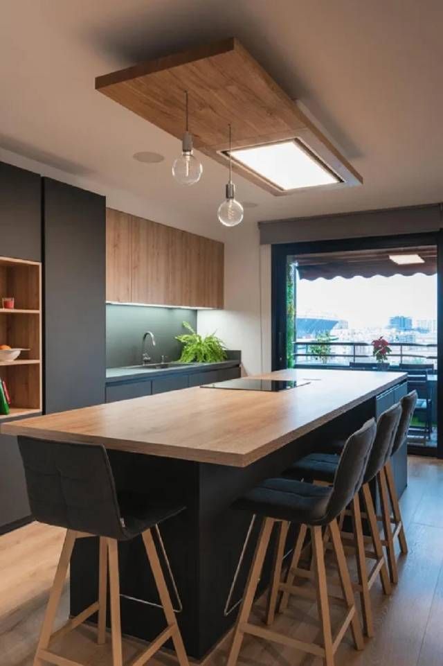 Cocina negra combinada con madera calidez, elegancia y modernidad 8