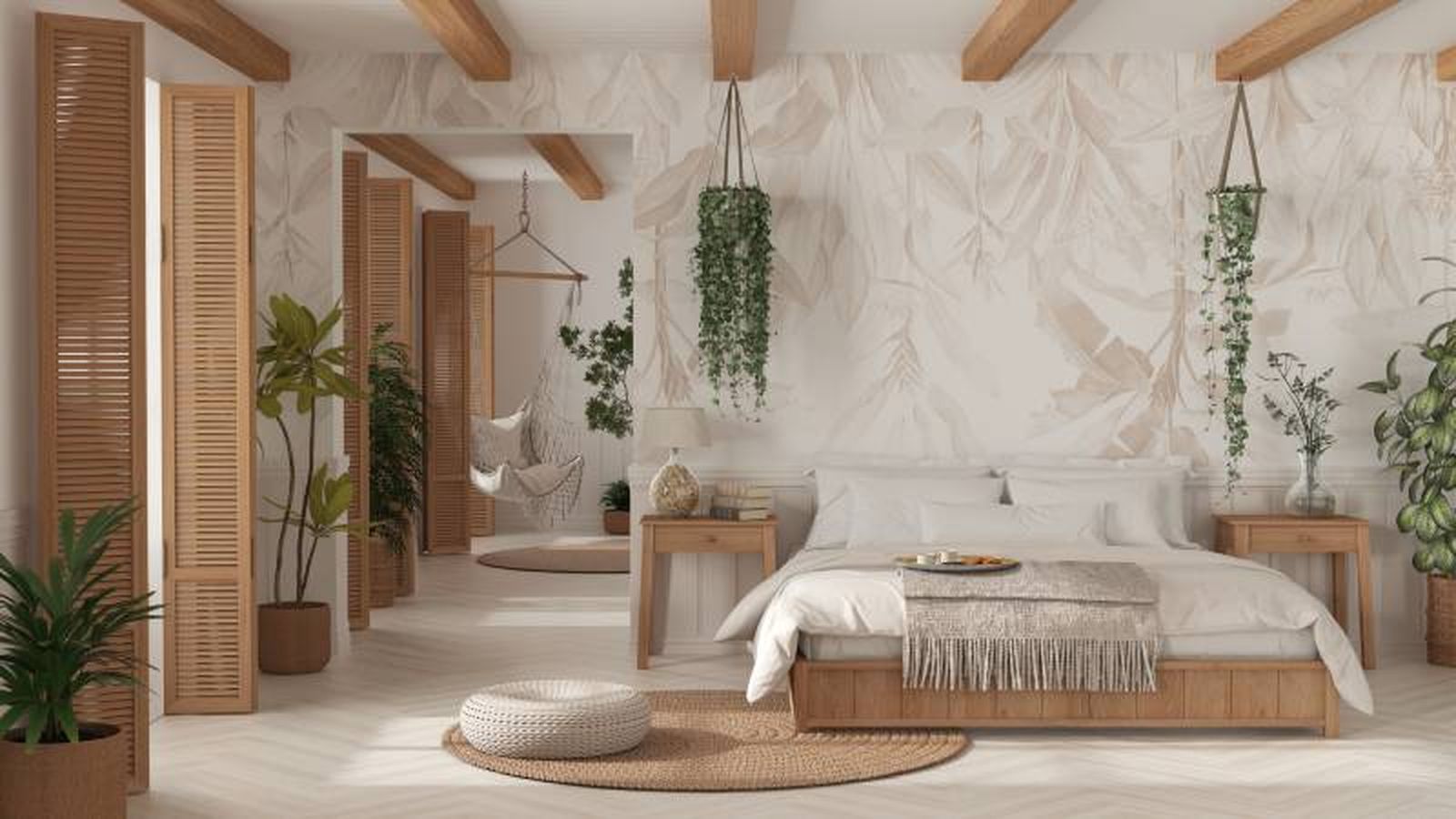 Dormitorio boho moderno con dos macetas colgantes.