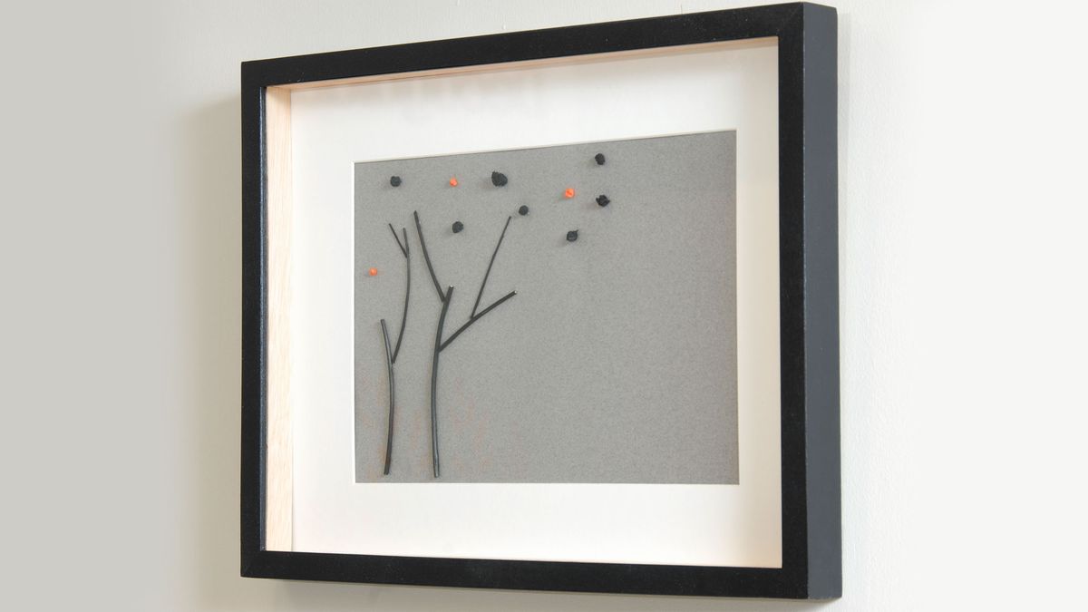 Hacer un cuadro con ramas y papel