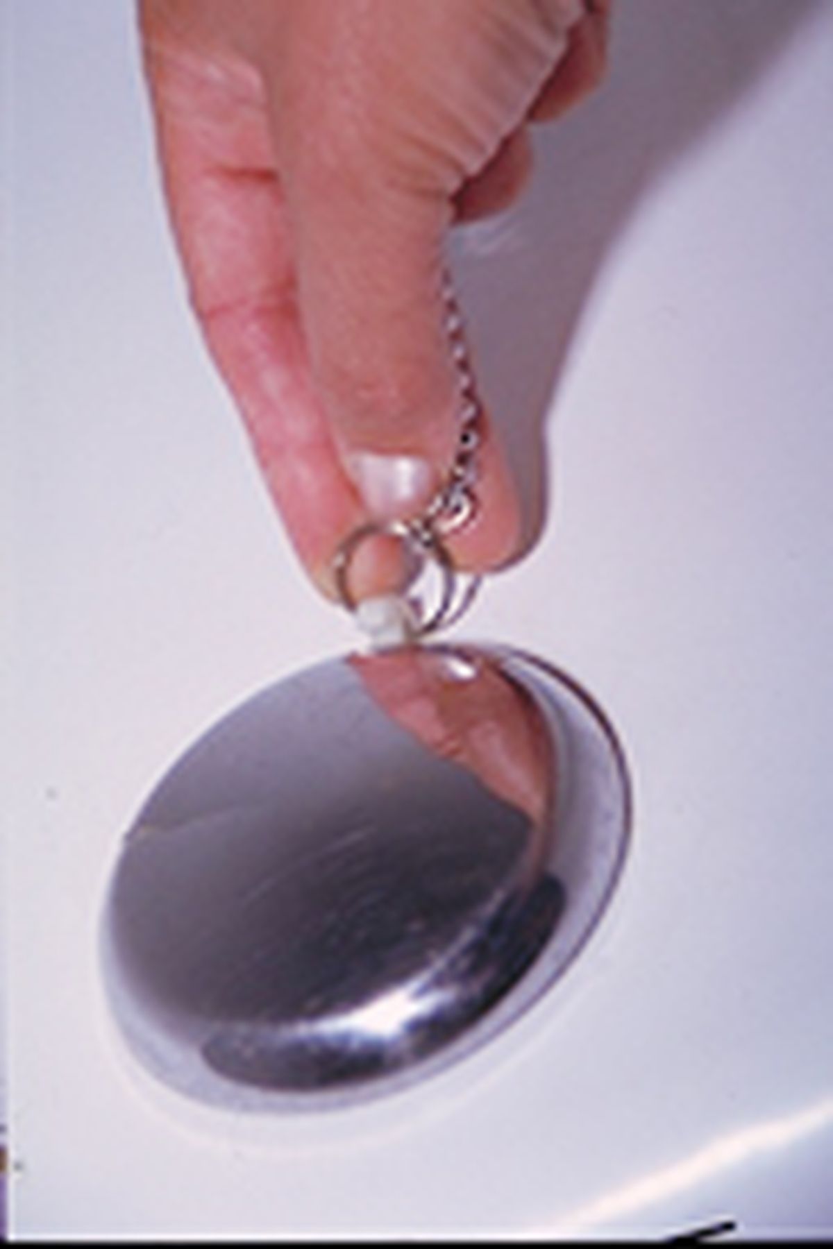 Sustitución de cadena y tapón de desagüe paso 4