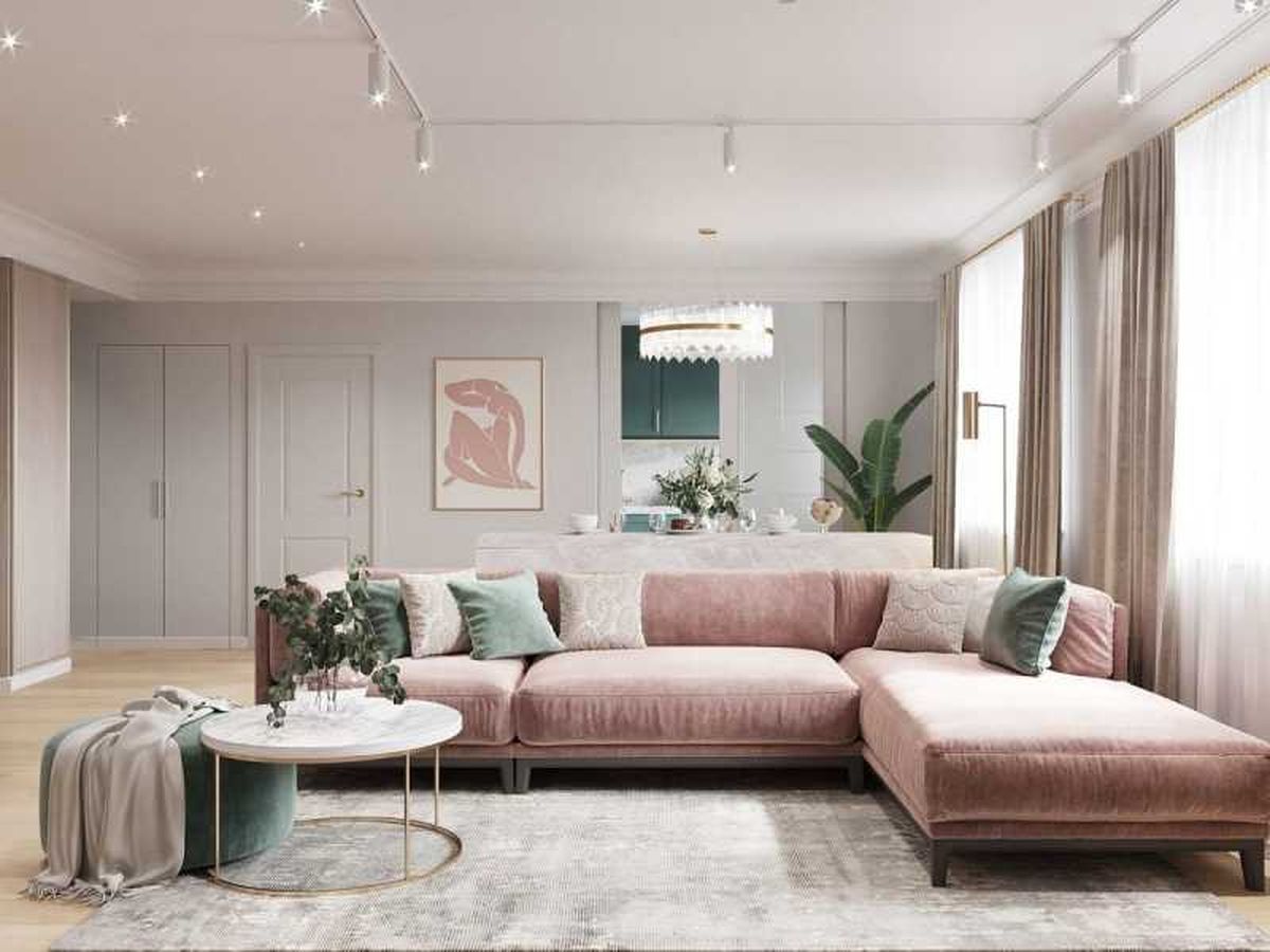 Salón con sofá rosa palo.