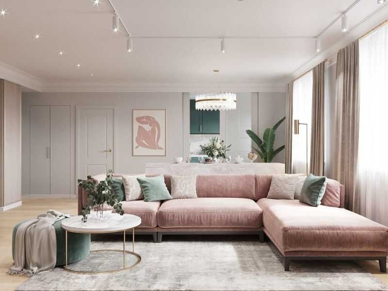 Salón con sofá rosa palo.