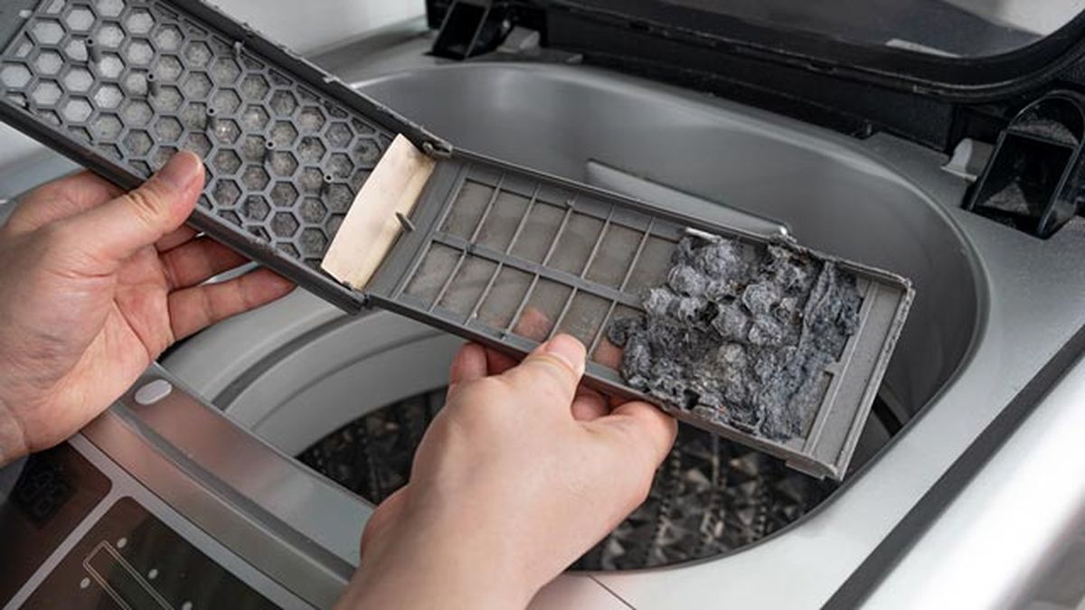 como limpiar filtro lavadora carga superior paso