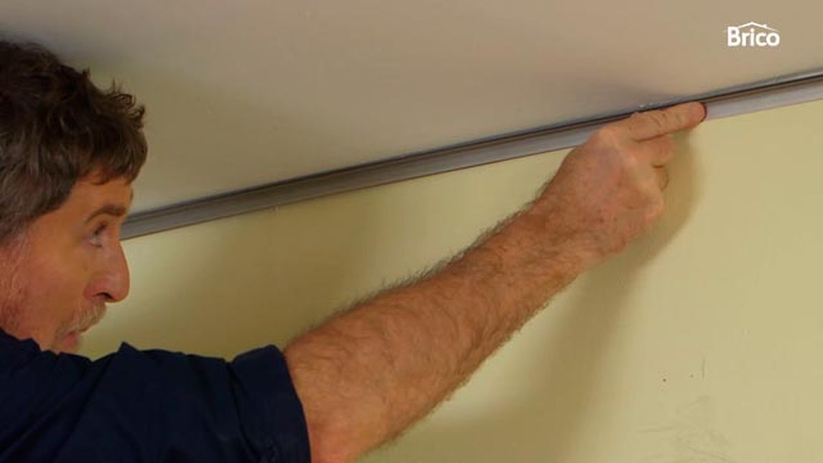 Cómo colocar revestimiento de pared de PVC paso 3